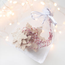 Load image into Gallery viewer, ceramic hanging Christmas tree ornament snowflakes. Pottery hanging snowlake set for holiday home decor.