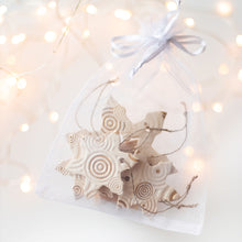 Load image into Gallery viewer, ceramic hanging Christmas tree ornament snowflakes. Pottery hanging snowlake set for holiday home decor.