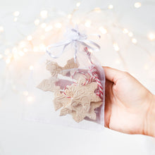 Load image into Gallery viewer, ceramic hanging Christmas tree ornament snowflakes. Pottery hanging snowlake set for holiday home decor.