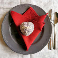 Load image into Gallery viewer, Our handmade ceramic custom place settings are a stunning alternative to flimsy paper place cards. They provide a memorable way to guide your friends and family to the right seats at your reception or shower. Additionally, the charming ceramic hearts make wonderful keepsakes to treasure after the celebration is over.
