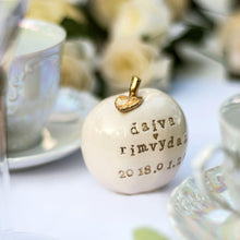 Load image into Gallery viewer, Wedding cake topper. Celebrate the apple of your eye with this adorable fruit! Handcrafted engraved with the love of your life’s new name is the perfect wedding gift. Give them something they’ll remember, something that will last for years and years!