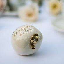 Load image into Gallery viewer, Wedding cake topper. Celebrate the apple of your eye with this adorable fruit! Handcrafted engraved with the love of your life’s new name is the perfect wedding gift. Give them something they’ll remember, something that will last for years and years!