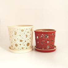 Load image into Gallery viewer, Keep your orchids or other house plants happy in an attractive carved ceramic orchid planter! Each one has carved patterns to allow for aeration of the soil inside the container. You could use this ceramic planter as a fruit bowl or candle holder.