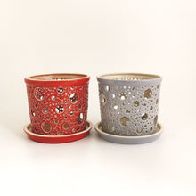 Load image into Gallery viewer, Keep your orchids or other house plants happy in an attractive carved ceramic orchid planter! Each one has carved patterns to allow for aeration of the soil inside the container. You could use this ceramic planter as a fruit bowl or candle holder.