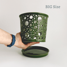 Load image into Gallery viewer, Keep your orchids or other house plants happy in an attractive carved ceramic orchid planter! Each one has carved patterns to allow for aeration of the soil inside the container. You could use this ceramic planter as a fruit bowl or candle holder.