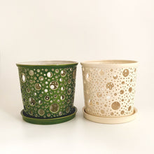 Load image into Gallery viewer, Keep your orchids or other house plants happy in an attractive carved ceramic orchid planter! Each one has carved patterns to allow for aeration of the soil inside the container. You could use this ceramic planter as a fruit bowl or candle holder.