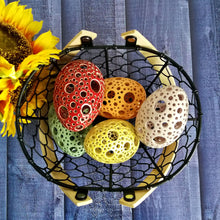 Load image into Gallery viewer, Add all the colors of spring to your home with these gorgeous Easter eggs! These carved ceramic eggs make beautiful spring decorations. Use them as Easter table decor or place them on a shelf or countertop as a springtime accent piece.