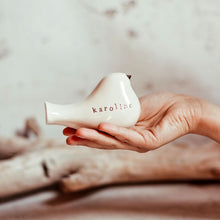 Load image into Gallery viewer, This pair of beautiful wedding cake toppers will add a classy finishing touch to your cake! The elegant cake toppers represent a pair of love birds or white doves. These cake toppers will decorate not only your wedding cake but also your home.