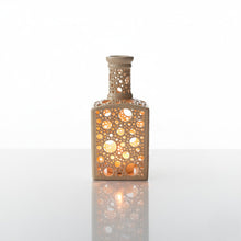 Load image into Gallery viewer, Handmade Ceramic Bottle Candle Holder with Cutout Pattern

