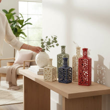 Load image into Gallery viewer, Handmade Ceramic Bottle Candle Holder with Cutout Pattern
