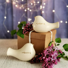 Load image into Gallery viewer, This pair of beautiful wedding cake toppers will add a classy finishing touch to your cake! The elegant cake toppers represent a pair of love birds or white doves. These cake toppers will decorate not only your wedding cake but also your home.
