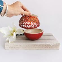 Load image into Gallery viewer, These ceramic bowls with a lid are ideal to use as a vanity jar to keep small valuables safe in the bathroom or bedroom. Ceramic bowls are made from white clay with gold-painted accents and hand-carved cut-outs in the lid.
