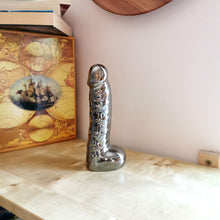 Load image into Gallery viewer, Gold penis sculpture - erotic wall or shelf decor. Silver penis deluxe contemporary erotic art for modern interiors. Penist for a bachelorette, hen or any &quot;adults only&quot; party . Gold penis a hook for sexy lingerie. Silver penis modern paperweight.

