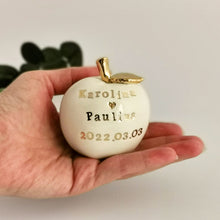 Load image into Gallery viewer, Wedding cake topper. Celebrate the apple of your eye with this adorable fruit! Handcrafted engraved with the love of your life’s new name is the perfect wedding gift. Give them something they’ll remember, something that will last for years and years!
