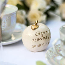 Load image into Gallery viewer, Wedding cake topper. Celebrate the apple of your eye with this adorable fruit! Handcrafted engraved with the love of your life’s new name is the perfect wedding gift. Give them something they’ll remember, something that will last for years and years!

