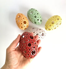 Load image into Gallery viewer, Add all the colors of spring to your home with these gorgeous Easter eggs! These carved ceramic eggs make beautiful spring decorations. Use them as Easter table decor or place them on a shelf or countertop as a springtime accent piece.
