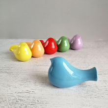 Load image into Gallery viewer, Celebrate spring with these cheerful ceramic bird figurines! Ceramic bird figurines available in pastel rainbow colors these sweet bird figures can be used for home decor or as cake toppers. Bird can be used to announce the arrival of a rainbow baby!

